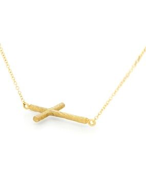 Tiffany and Co. Paloma Picasso 18 carat gold hammered sideways cross necklace